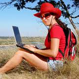 Person moving overseas with a laptop