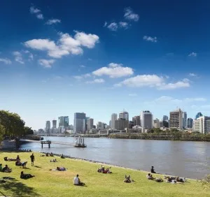 People moving next to the Brisbane river