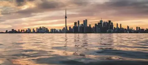 Aussies Moving Overseas withToronto City in the background